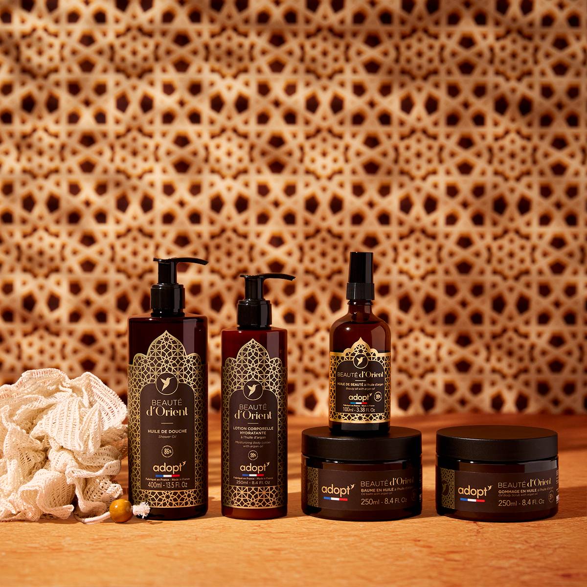 Coffret Soin avec huile de douche 400 ml + lotion corporelle 250 ml + huile de beauté corps et cheveux 100 ml + fleur de bain + baume en huile 250 ml + gommage en huile 250 ml  - Beauté d'Orient