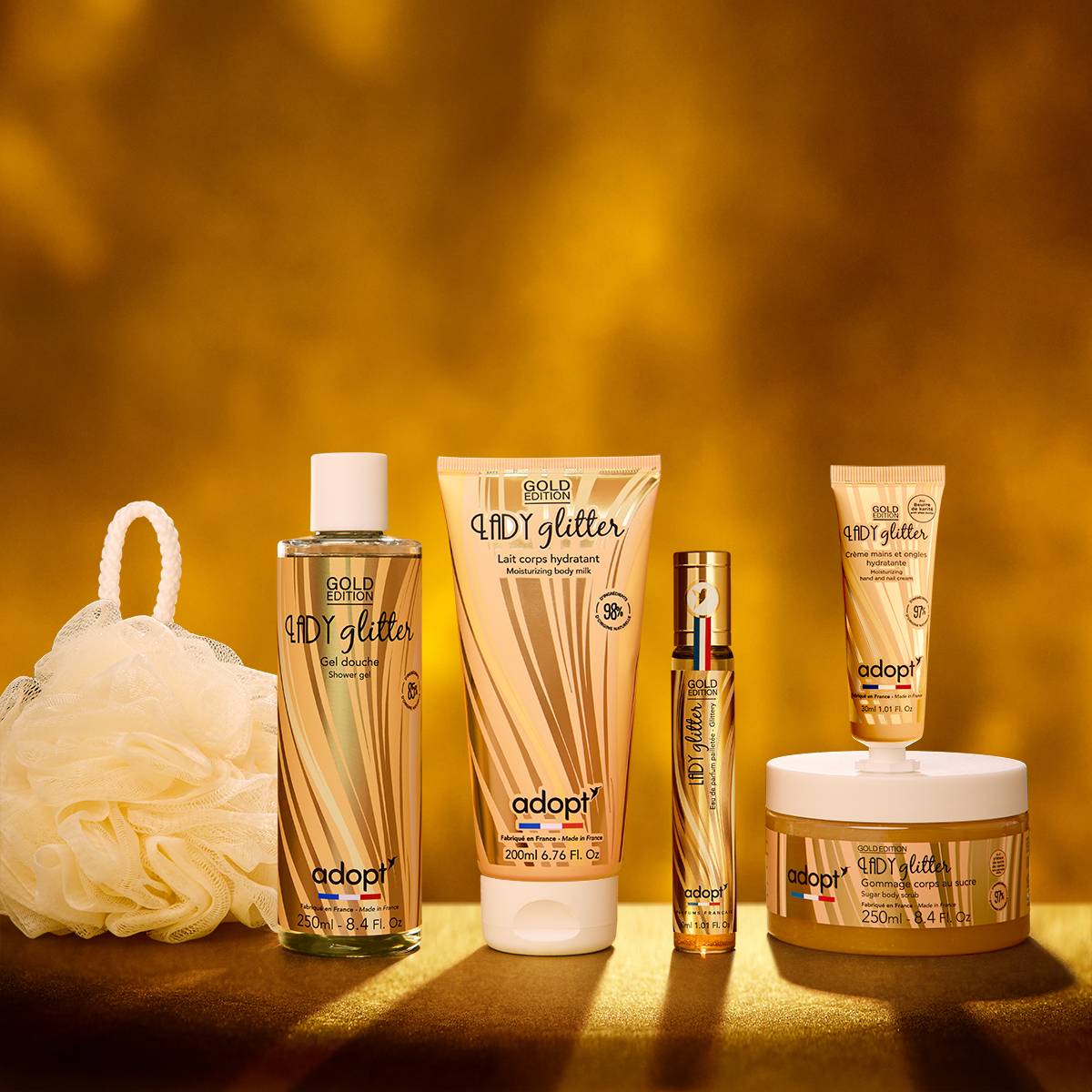 Coffret maxi eau de parfum 30 ml + gel douche 250 ml + lait corps 200 ml + crème pour les mains 30 ml + gommage au sucre 250ml + fleur de bain - Lady Giltter Gold Edition